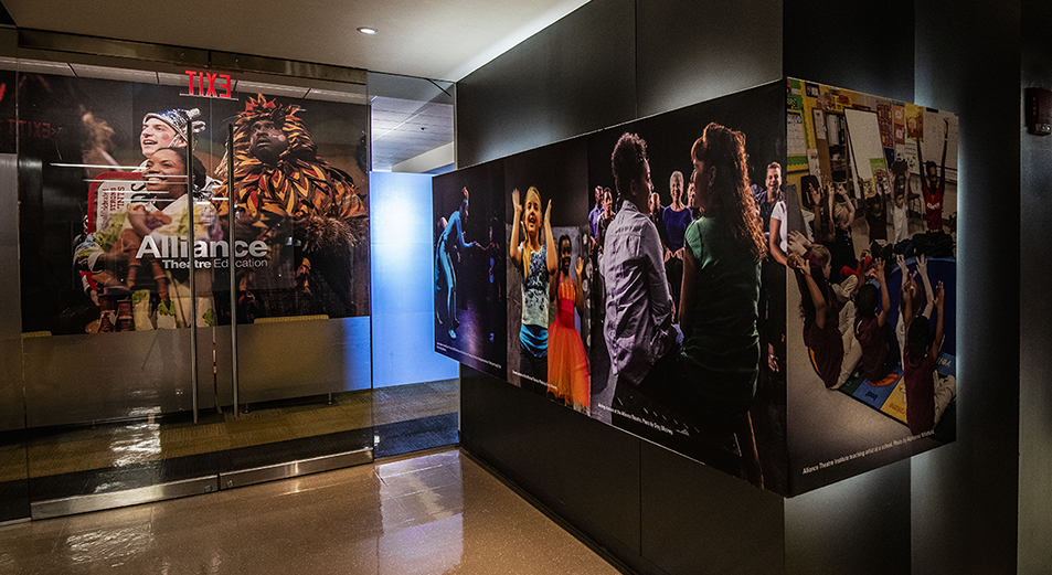 Alliance Theatre renovation included many SEG lightboxes, wall coverings, and wayfinding signage