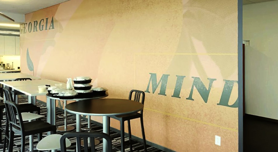 Pandora Headquarters branded their cafeteria and dining area with a Georgia On My Mind wallcovering displaying peaches and the song lyrics